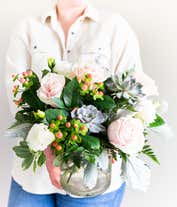 Alternative image 4 for A charming floral arrangement featuring pink roses, white lisianthus, peach berries, a succulent cutting, all beautifully arranged in a glass vase, with an option for personalization. This vibrant mix creates a stunning and unique display.
