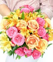 Alternative image 1 for Orange roses, hot pink roses and yellow alstroemeria in glass vase