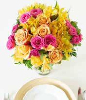 Alternative image 2 for Orange roses, hot pink roses and yellow alstroemeria in glass vase