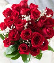 Alternative image 2 for One Dozen Red Roses with monte casino in a glass vase with a red bow