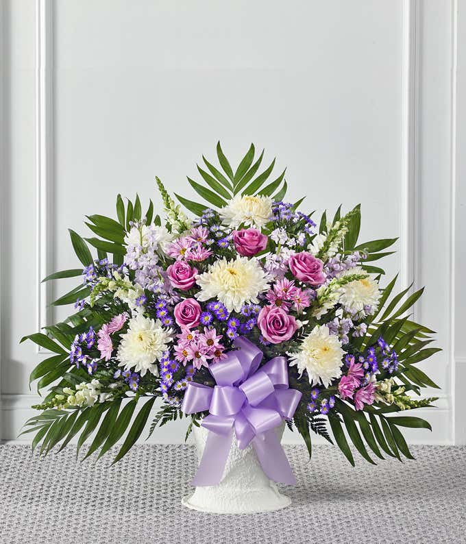 Purple and white flower sympathy basket