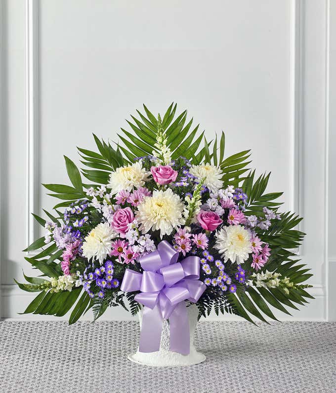 Purple and white flower sympathy basket