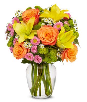 Yellow lilies, orange roses and pink matsumoto bouquet