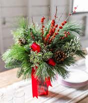 Alternative image 2 for Pine branches, pine cones and holly branches in red vase for Christmas
