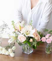 Alternative image 1 for A close up picture of an all white flower bouquet.