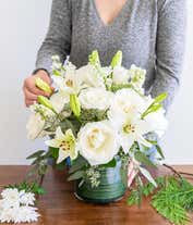 Alternative image 2 for A close up picture of an all white flower bouquet.