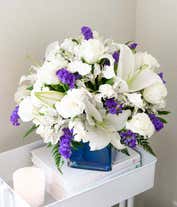 Alternative image 4 for A close up picture of an all white flower bouquet.