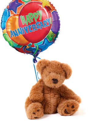 Happy anniversary balloon delivered with teddy bear