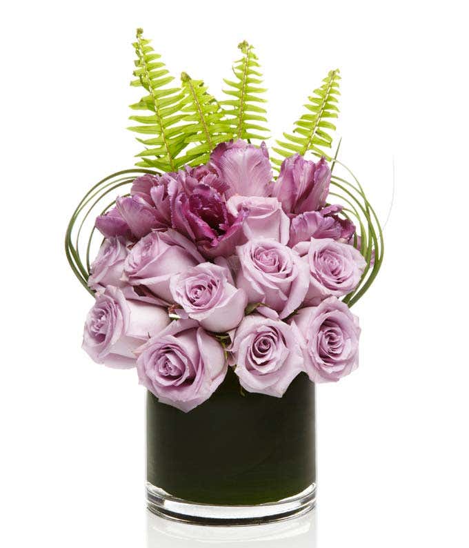 Purple rose and purple tulip arrangement 
