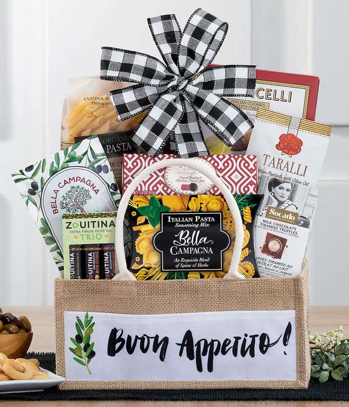 Gift basket with Italian gourmet treats and a green bow.