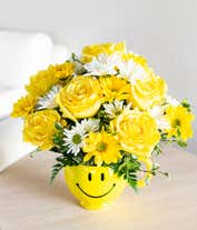 Alternative image 4 for Yellow roses and bright daisies in a yellow smiley face mug