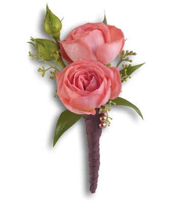 Coral spray rosee Boutonniere
