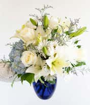 Alternative image 1 for Blue hydrangea, white roses and white oriental lilies in a blue vase