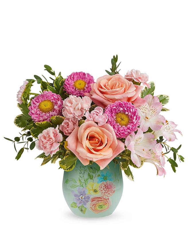 Peach Roses, Pink Alstroermia, Mini Pink Carnations, Pink Matsumoto Asters, and floral greenery in a blue vase with watercolor floral designs