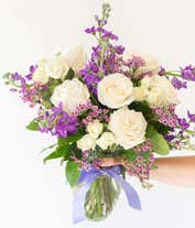 Alternative image 1 for White roses and purple stock in a vase