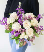 Alternative image 3 for White roses and purple stock in a vase