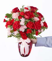 Alternative image 2 for Red roses, pink carnations in a red vase for a romantic bouquet