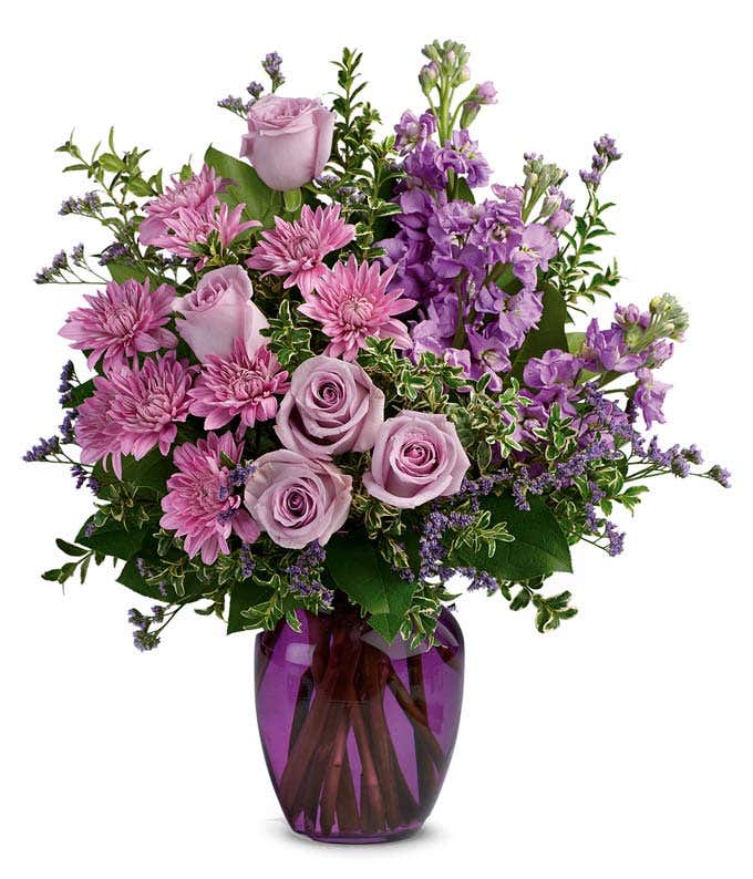 All purple arrangement with purple roses and purple mums
