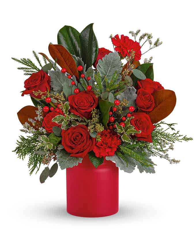 Pine and Nature themed Red and Green Rose bouquet in red vase