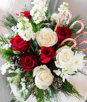 Alternative image 1 for Red roses, white snapdragons and cedar with candy cane bouquet