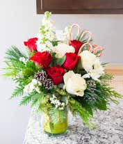 Alternative image 2 for Red roses, white snapdragons and cedar with candy cane bouquet
