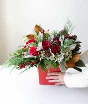 Alternative image 4 for Red roses, pine cones and red hypericum berries christmas bouquet