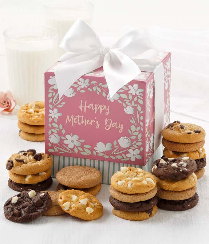 A beautifully decorated Mother's Day gift box filled with 24 Nibblers Bite-Sized Cookies in assorted flavors, including Semi-Sweet Chocolate, Triple Chocolate, Cinnamon Sugar, and White Chocolate Macadamia.