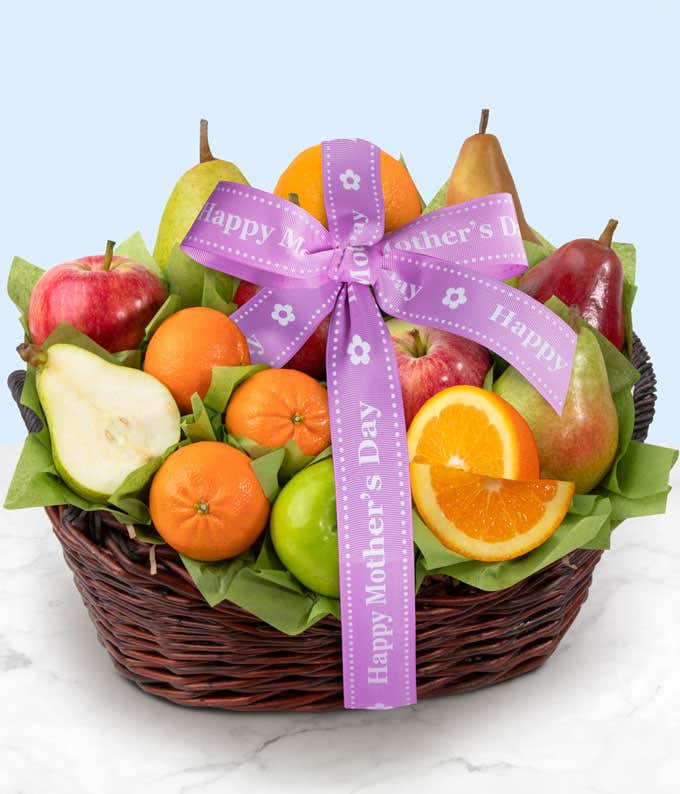 Wicker gift basket with kiwi fruits, oranges, red and green apples, red and green pears, and mandarins with a Happy Mother's Day ribbon