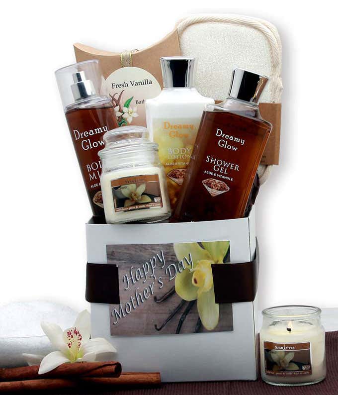 Image of a Mother's Day Spa Gift Box containing Vanilla Body Lotion, Bath Gel, Body Spray, Foaming Bath Salts, Vanilla Wax Melts, Bath Sponge, and adorned with a bow and 