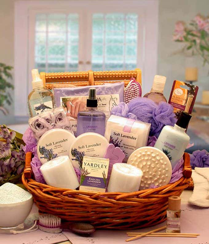 Lavender-themed spa gift basket with lotions, soaps, bath products, and relaxation essentials.