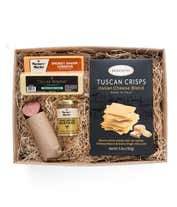 A charcuterie box with two types of cheese, crackers, stone-ground mustard, and a summer sausage.