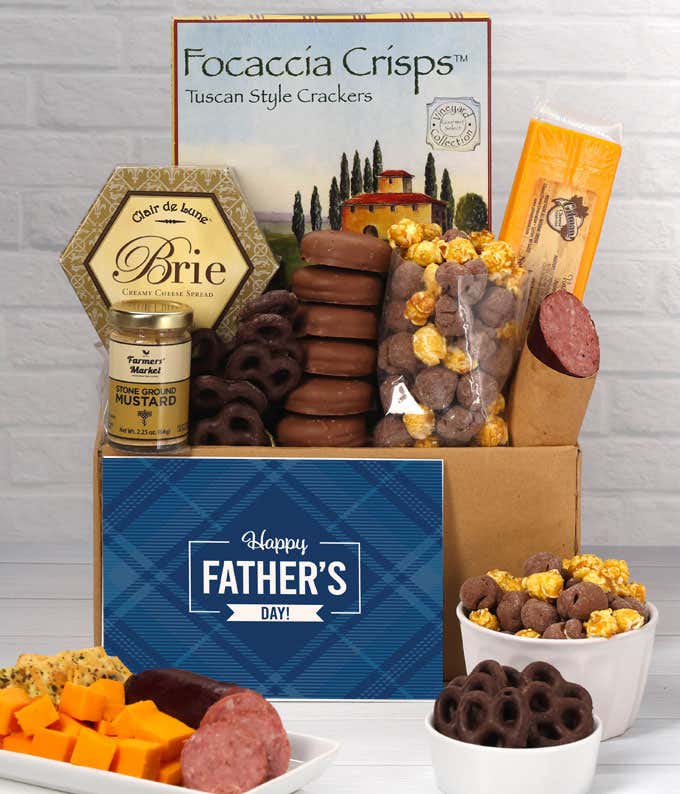 A box filled with focaccia crisps, 2 cheeses, mustard, sausage, chocolate-covered pretzels, caramel popcorn, and chocolate-covered Oreos, complete with a 'Happy Father's Day' card.
