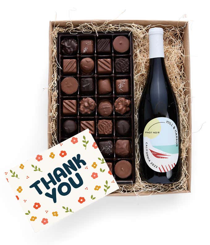 A gift box containing a bottle of California Pinot Noir by Hill & Harbor, a 1 lb box of 28 assorted gourmet chocolates, and a Thank You card.   A refined combination perfect to show your appreciation.