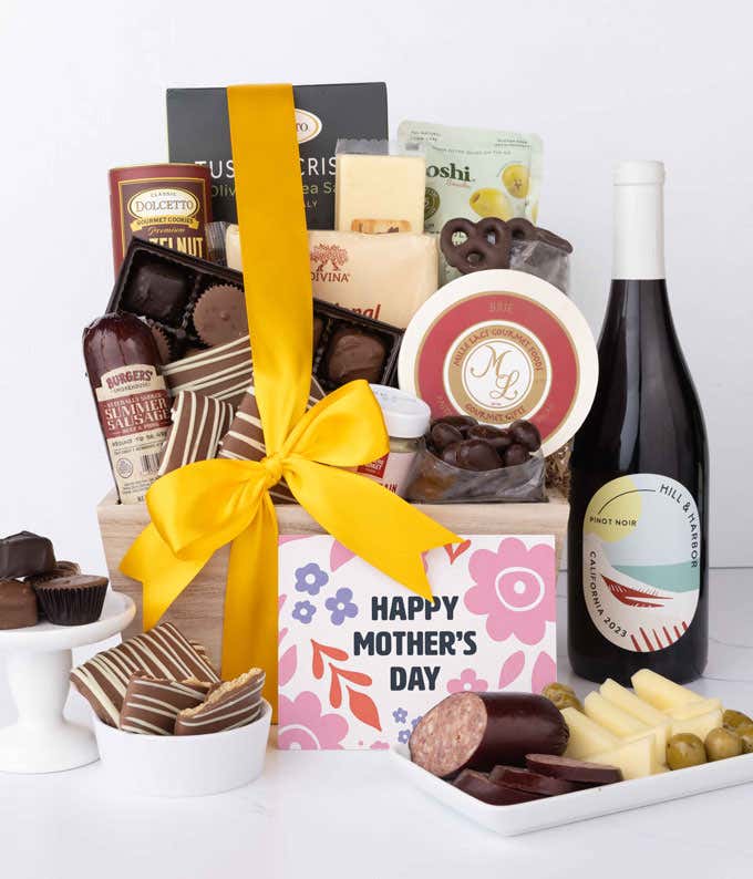 Wooden Mother’s Day gift crate filled with a bottle of Hill & Harbor Pinot Noir, summer sausage, brie, cheeses, Tuscan crisps, chocolates, pretzels, and gourmet snacks, displayed with a Mother’s Day card.