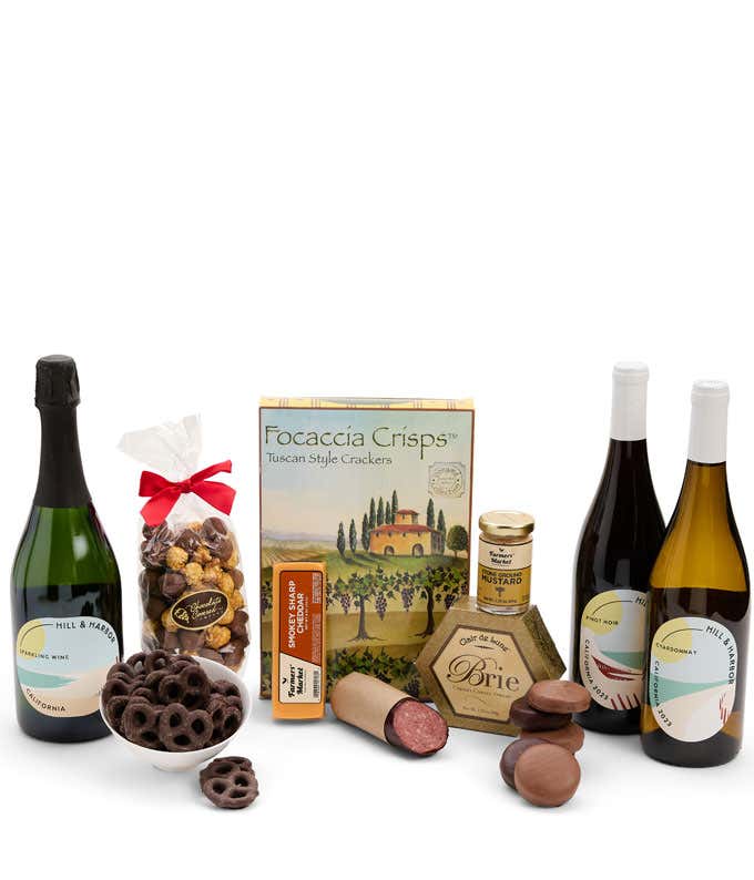 A gift set featuring a trio of California wines - red, white, and sparkling, focaccia crisps, 2 cheeses, mustard, summer sausage, caramel popcorn, chocolate pretzels, and 6 chocolate-covered Oreos for a sweet and savory gourmet experience.