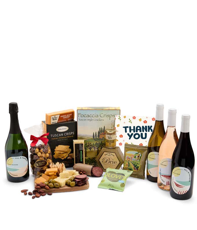 A wine and cheese gift set featuring 4 - bottles of Hill & Harbor wine - sparkling, white, ros and red. Includes a variety of gourmet cheeses, crackers, olives, summer sausage, almonds, and condiments finished with a Thank You card.