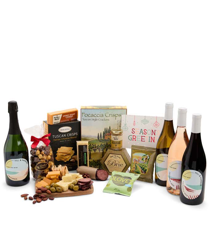 A wine and cheese gift set featuring 4 bottles of Hill & Harbor wine - sparkling, white rosé, and red. Includes 3 cheeses, crackers, olives, almonds, summer sausage, and condiments topped with a festive Season's Greetings card.