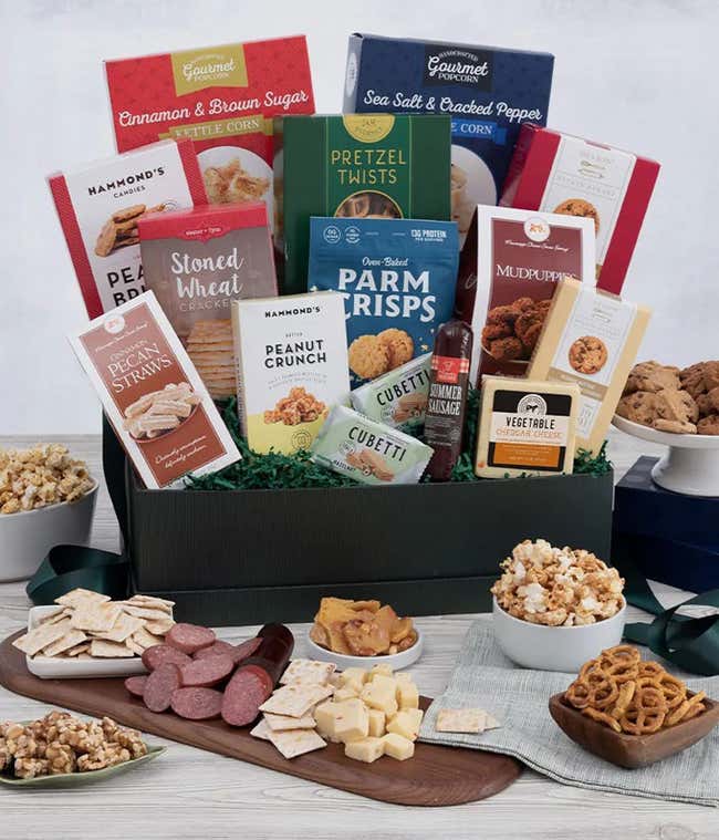 Gourmet snack basket with cheese, chocolate, sausage and more