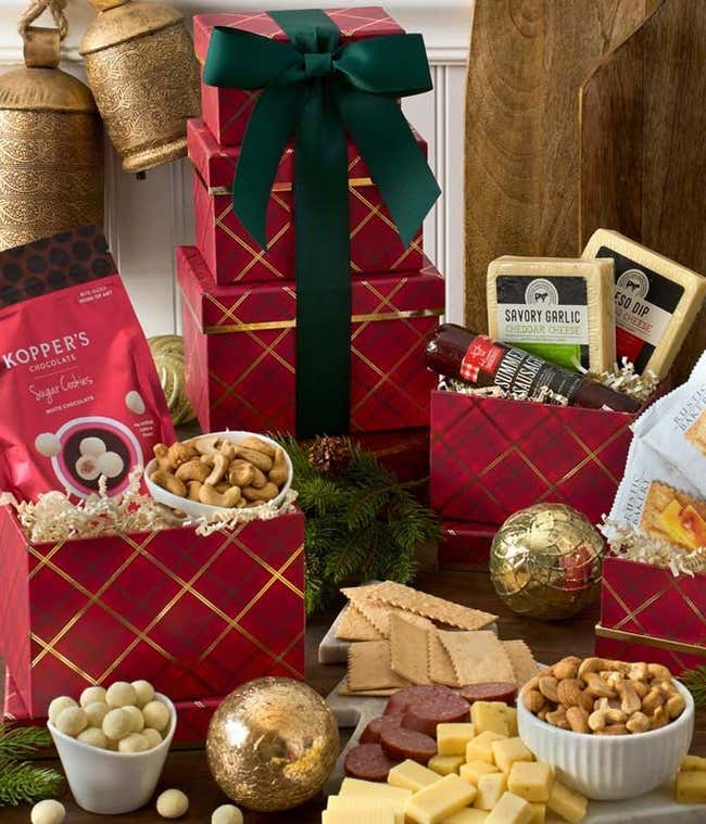 Green Gift Tower featuring Vegetable Cheddar Cheese, Tart Cherry, Cacao Nib, &amp; Almond Artisan Crisps, Citrus, Ginger, &amp; Thyme Artisan Crisps, Stoned Wheat Crackers, Sweet Soppressata, Jam or Honey, Roasted &amp; Salted Cashews.