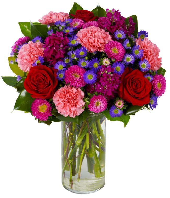 Red roses, pink carnations and hot pink Matsumoto asters in vase