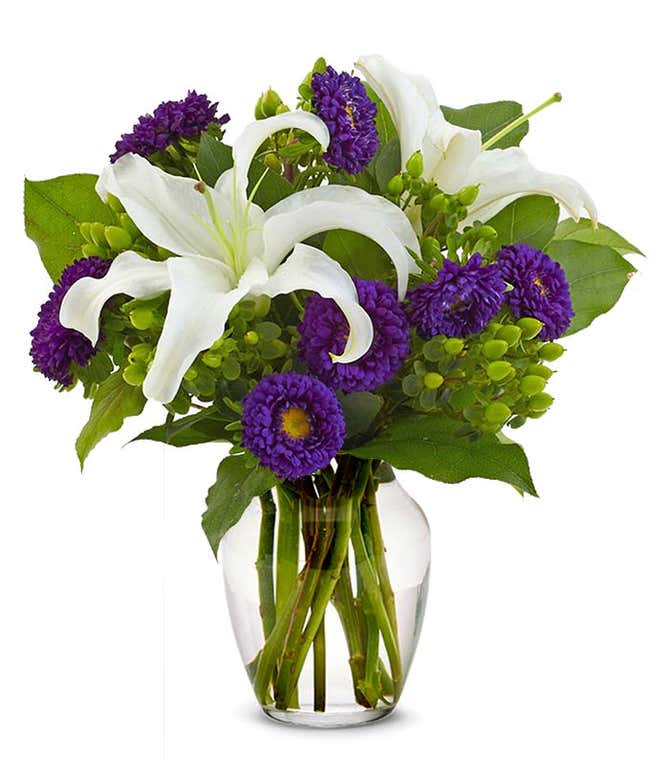 White lilies and purple aster bouquet