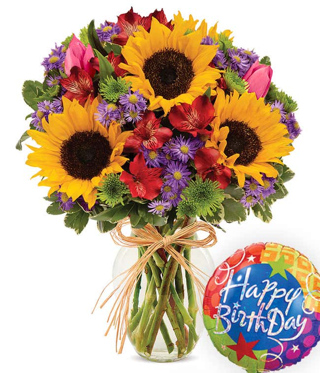 Birthday flowers for mom with sunflowers and tulips delivered with a happy birthday balloon