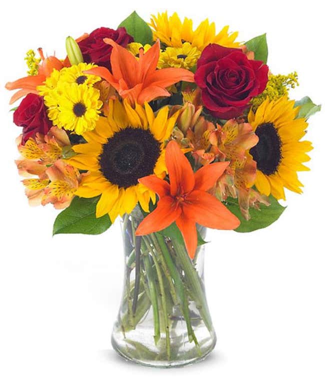 Sunflowers, orange alstroemeria and red roses in bouquet