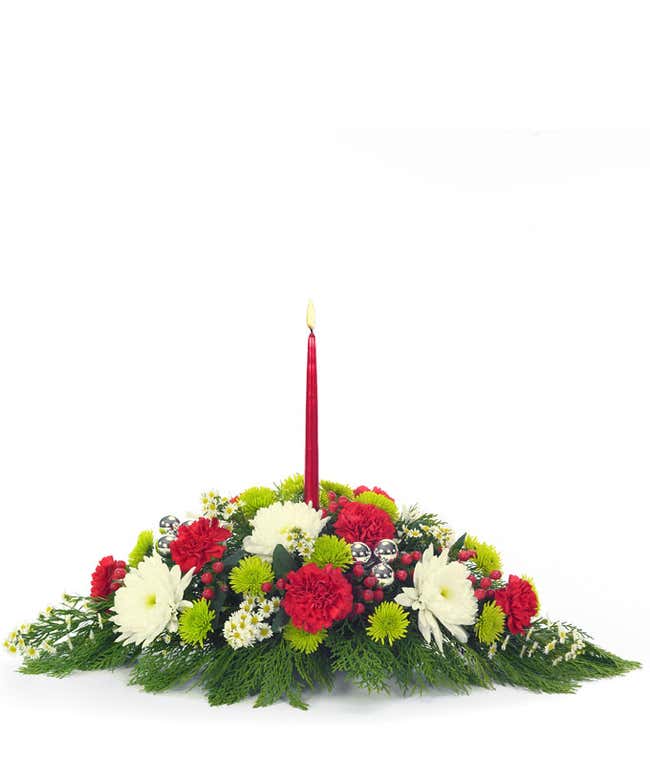 Christmas table centerpiece with red and white flowers