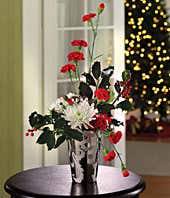 Red mini carnations, white mums and holly Christmas arrangement