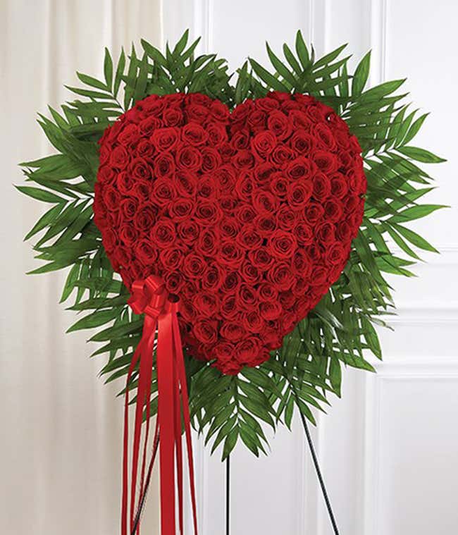 Red rose heart-shaped standing spray