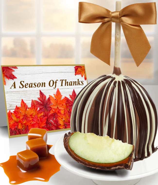 A decadent Belgian milk chocolate-dipped caramel apple, drizzled with Belgian white and dark chocolate.