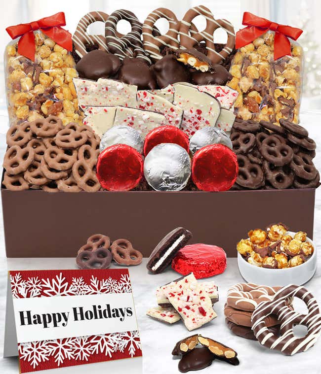 A delicious assortment: 6 milk Belgian chocolate covered OREO&reg; cookies, caramel popcorn (milk &amp; dark), almond caramel clusters, peppermint bark, pretzel twists (dark &amp; milk), and mini-pretzel twists (dark &amp; milk), elegantly presented in a gift box.