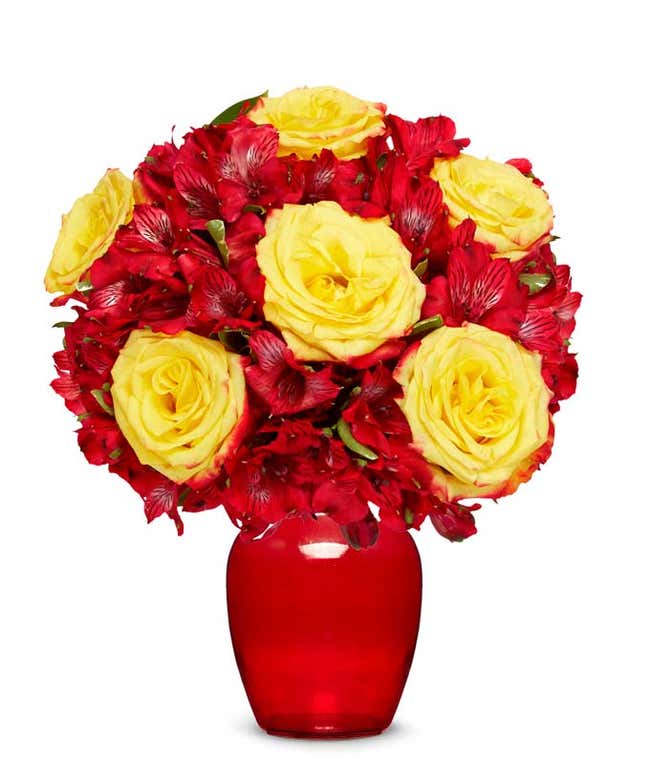 A bouquet of 12 mixed roses and alstroemerias, with an optional vase. Next to a nonagon clear acrylic keepsake reading 'you're amazing' with purple flowers.