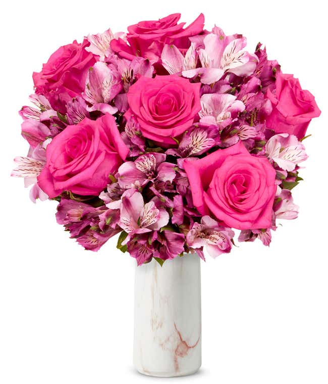 A bouquet featuring pink roses and pink alstroemeria, with an optional glass vase.